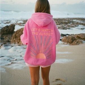 Vibrant Pink Hoodie with Sunset Design (dandy worldwide sweatshirt, size small)